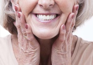 woman smiling with dentures