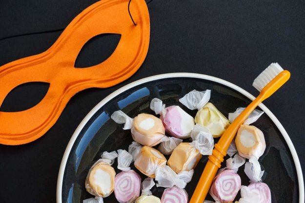 halloween toothbrush in candy encouraging dental care during halloween