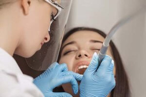 woman receiving dental bonding services