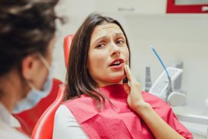 woman in dentist chair needing root canals