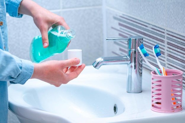 Patient Using Fluoride Mouthwash