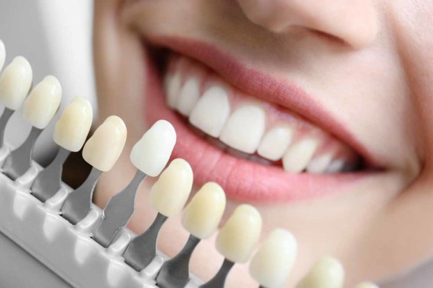 Adult Cosmetic Dentistry Options Woman Reviewing Cosmetic Dentistry Options