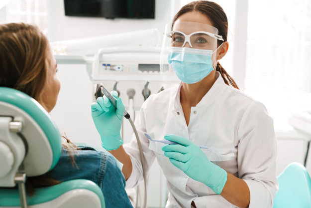 a dentist provides texas dental services at a dental office in houston
